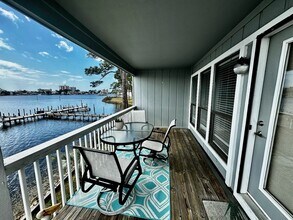 Building Photo - $500 discount on the first month's rent for qualified tenants Quality Waterfront Gated Community ...