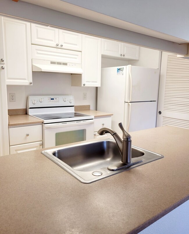 Building Photo - AVAILIBLE NOW | First Floor Condo: One Bedroom, One Bathroom & Spacious Lanai | Two Assigned Park...