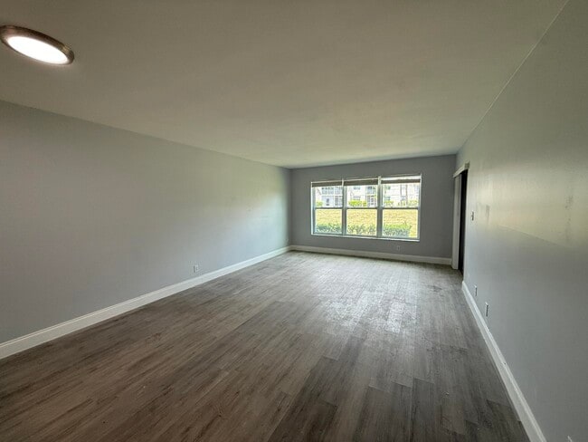 Building Photo - 7355 Woodmont Terrace
