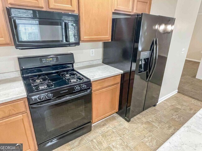 Building Photo - 6205 Tree Ridge Dr N W