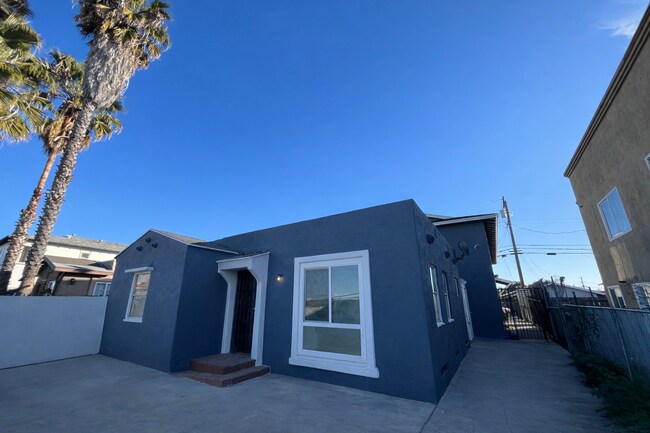 Building Photo - Newly Renovated 2 Bedroom Detached Unit with Private Patio, Updated Fixtures and Parking!