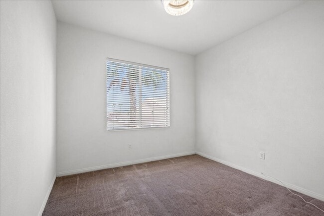 Building Photo - Contemporary Guard-Gated Retreat Near Rhodes Ranch Golf Club with Elegant Open-Concept Living