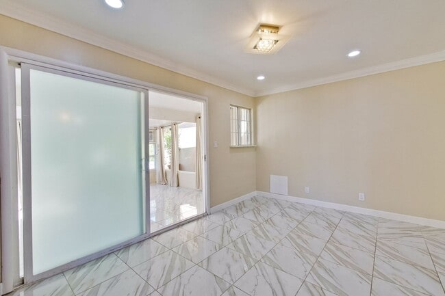 Building Photo - Turnkey Home with Natural Light & Upgrades...