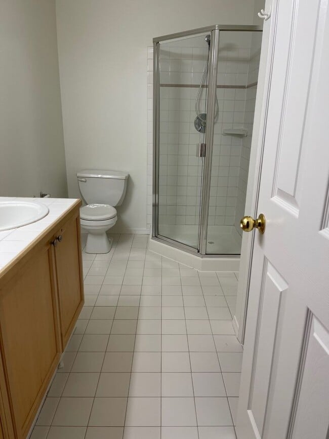 Building Photo - Bright, Spacious, Updated Condo with Separ...