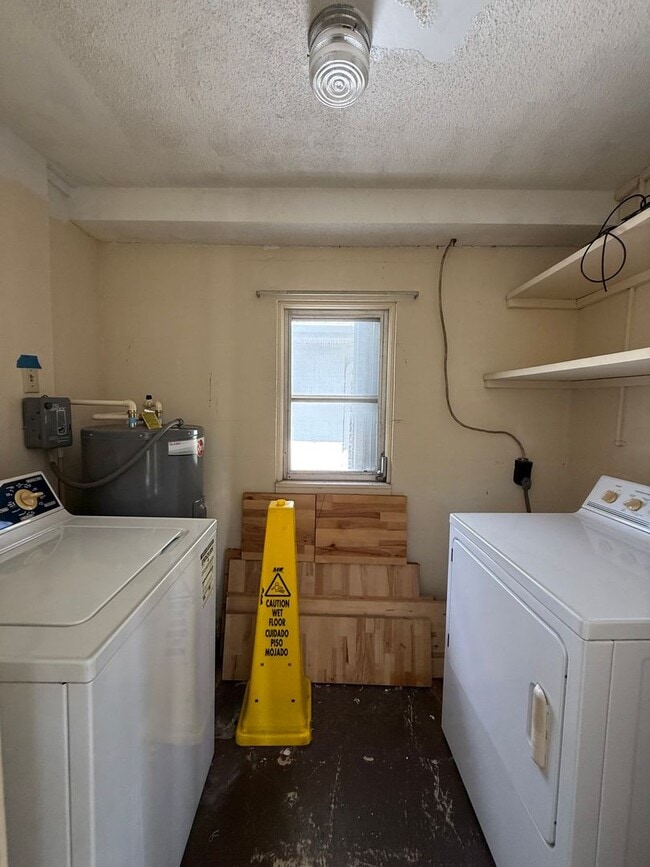 Building Photo - 2/2 with Fenced Yard, Garage and Laundry, Available Now!