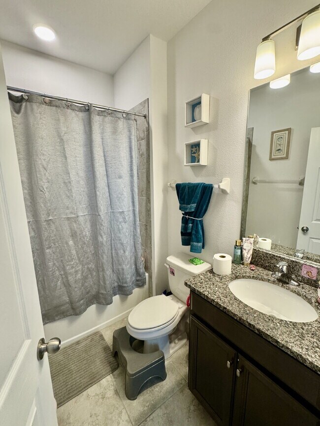 Building Photo - "Spacious 5-Bedroom Sanctuary with 4 Full ...