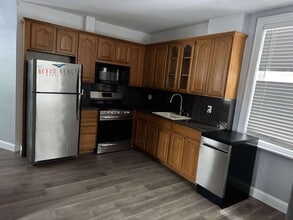 Building Photo - 21-44-44 71st St