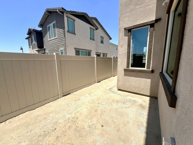 Building Photo - Brand-New 5-Bedroom, 3-Bath Single Family Home for Lease in Ontario with Solar Panels