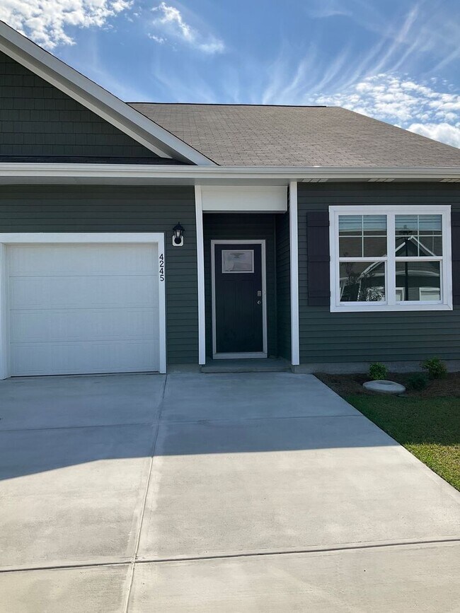 Building Photo - Welcome to this stunning townhouse in Leland, NC!