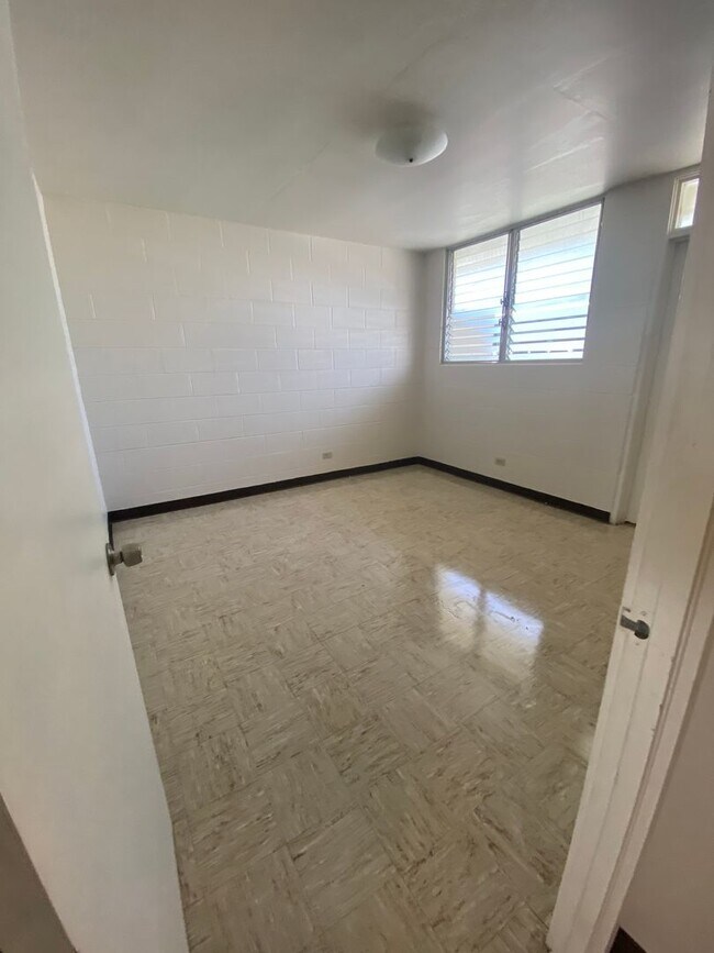 Building Photo - 1217/1223/1227 Kamaile Street