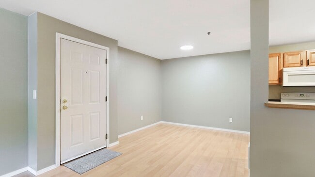 Building Photo - This ground floor corner-unit condo