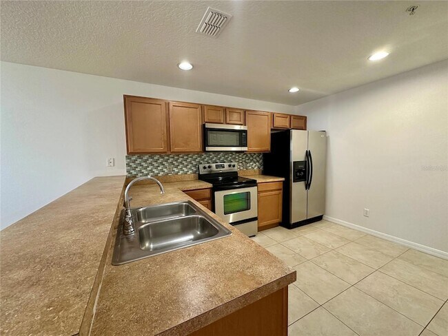 Building Photo - 13511 Tea Rose Way