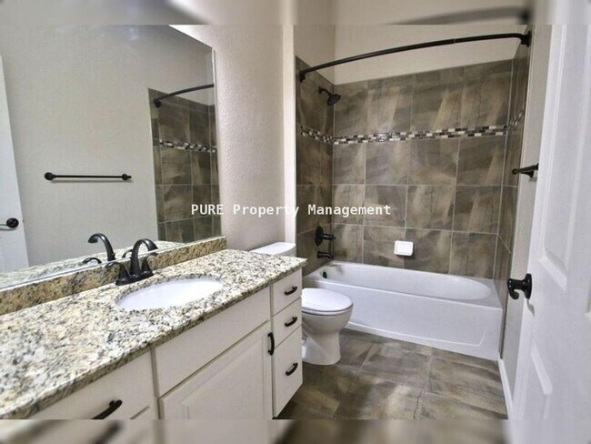 Building Photo - Large patio home with partially finished basement, attached 2-car garage!