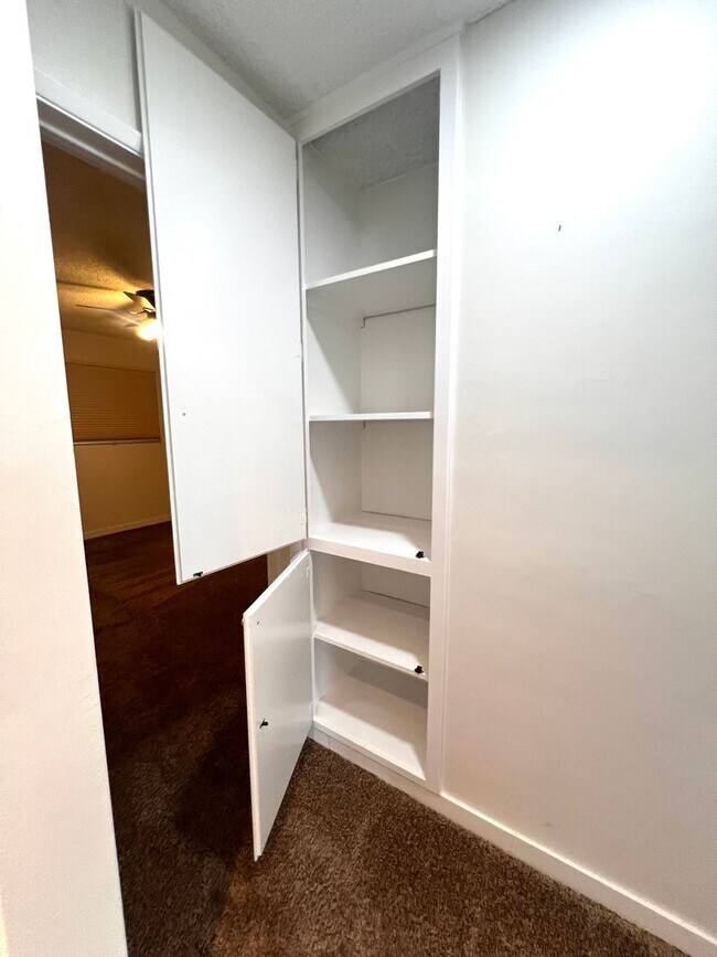 Building Photo - Private Back House with single garage & yard