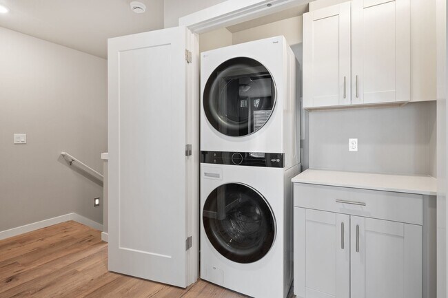 Building Photo - NEW CONSTRUCTION – Stylish 4-Bedroom Townh...