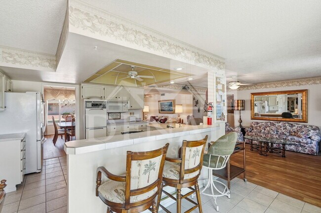 Building Photo - 9807 W Mockingbird Dr