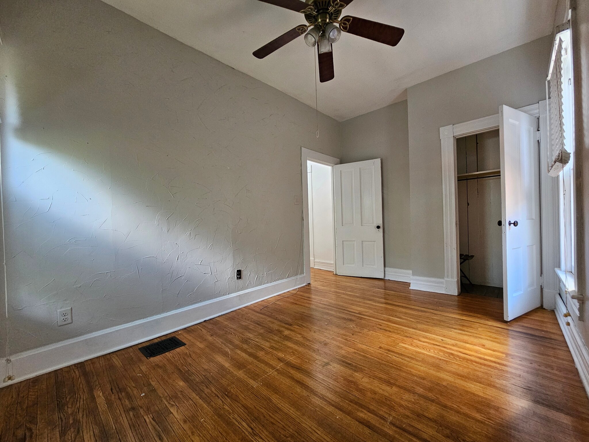 Tall ceilings and wooden flooring throughout second level. - 943 Highland St