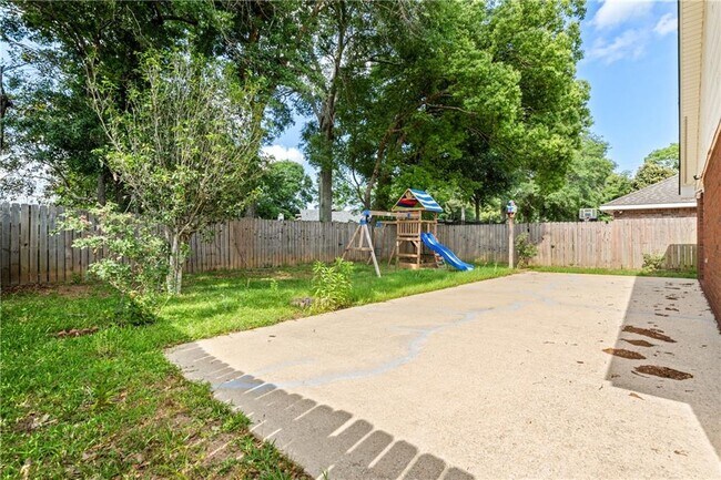 Building Photo - 8158 Magnolia Village Dr N
