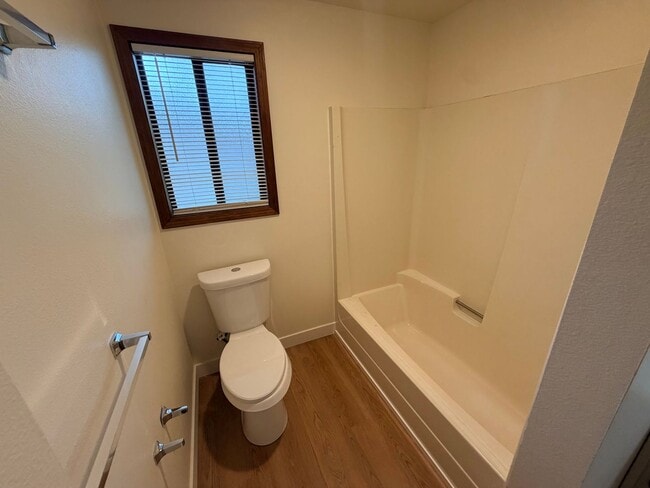 Building Photo - Brand New Flooring and Paint Upper Level Duplex