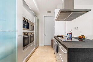 Building Photo - 18201 Collins Ave