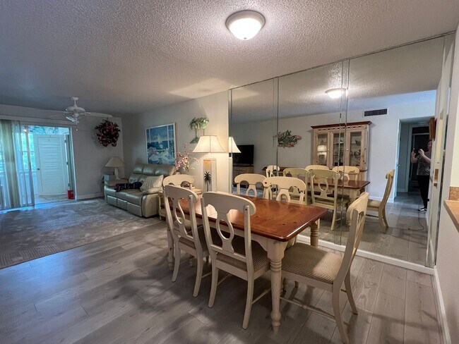 Building Photo - *55+ Community* 2nd floor furnished Condo