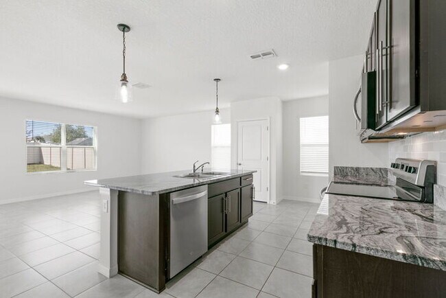 Building Photo - LIKE3 NEW Home For Rent in Avalon Park West!