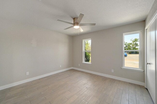 Building Photo - 10 Cypress Fairway Village