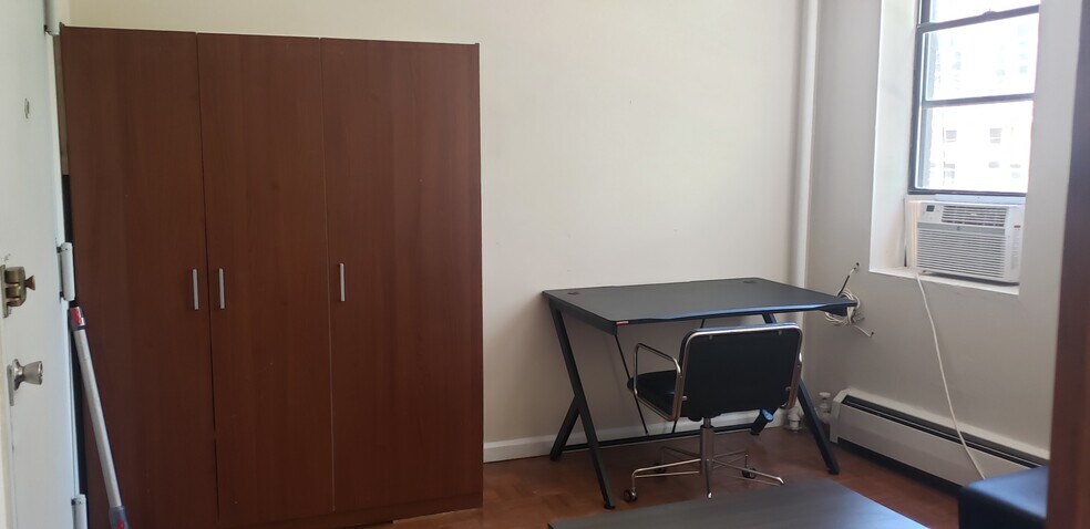 Large entry closet, desk and chair - 240 E 23rd St