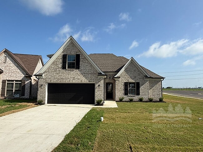 Building Photo - Welcome to this spacious 4 bedroom, 3 bath...