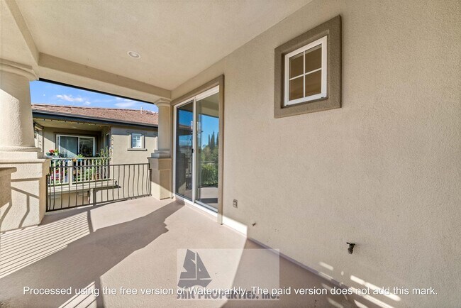 Building Photo - Welcome to this stunning 2-bedroom condo in gated community