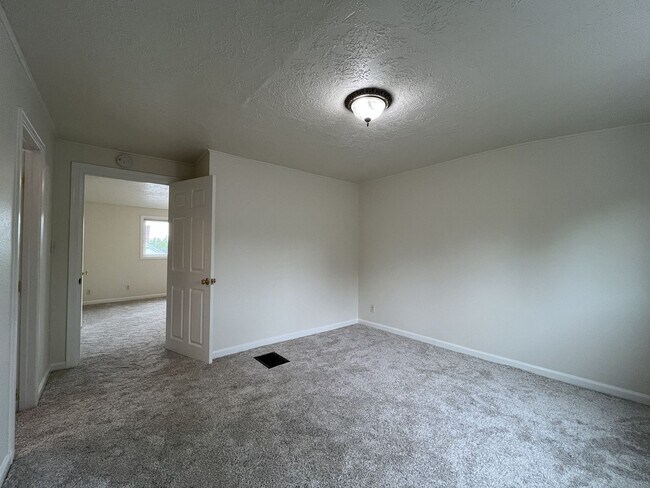 Building Photo - Character-Filled Concordia Home with Flexible Living Spaces & Gas Fireplace