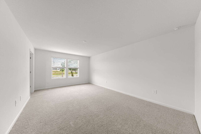 Building Photo - Be the First to Lease This 3BR Townhome in Marion Ranch | Loft + Garage + Screened Lanai + Includ...