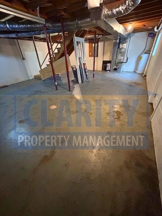 Building Photo - Three bedroom with attached garage!