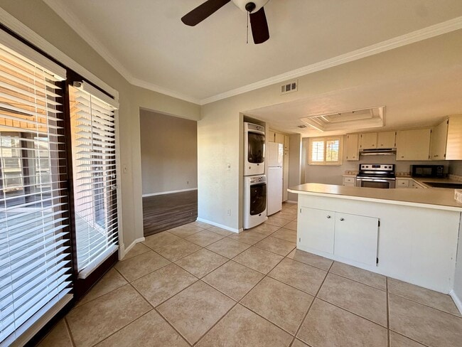 Building Photo - Light-Filled 2BR Condo in Gated Pelican Bay Near Golf, Beach & I-95