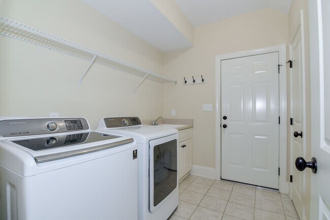 Building Photo - Heart of Evans - Landscaping Included