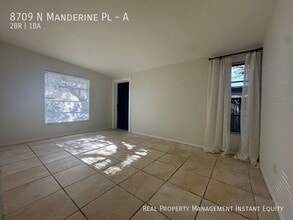 Building Photo - 8709 N Mandarine Pl