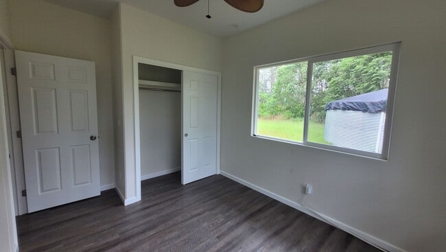 Building Photo - This 3-bedroom, 2-bath home in Orchidland Subdivision