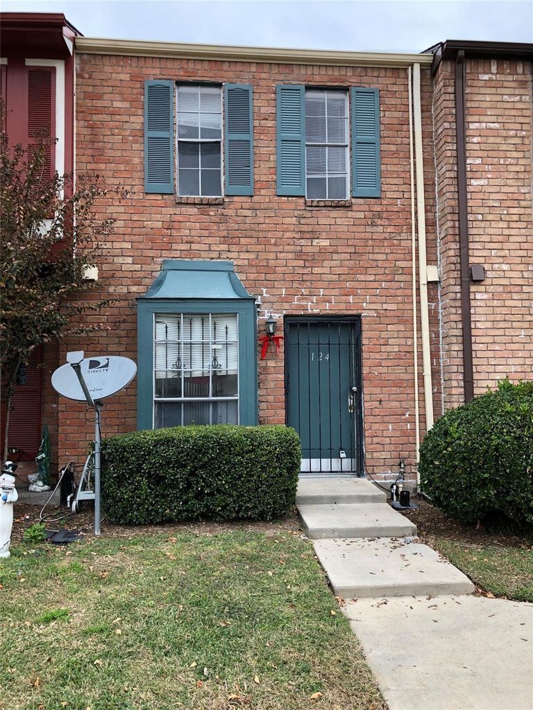 Charming exterior with great curb appeal in a well-maintained community. UNIT 124 - 7700 Creekbend Dr