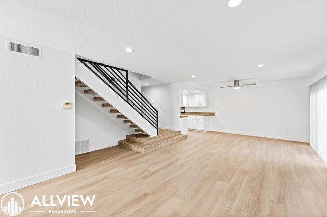 Building Photo - Upgraded 3 Bedroom Townhome in the Gated C...