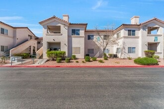 Building Photo - Bright & Stylish Condo with Fireplace and Private Balcony in a Resort-Style Community!