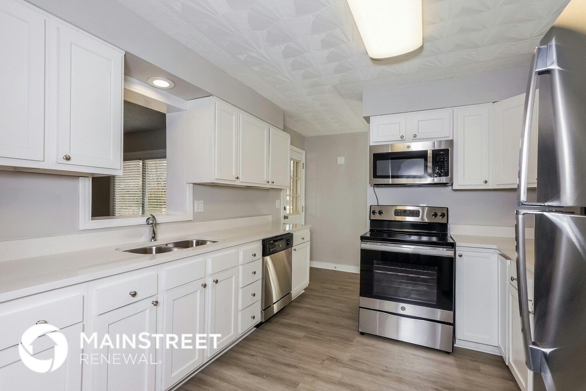 Building Photo - 7706 Poinsettia Dr