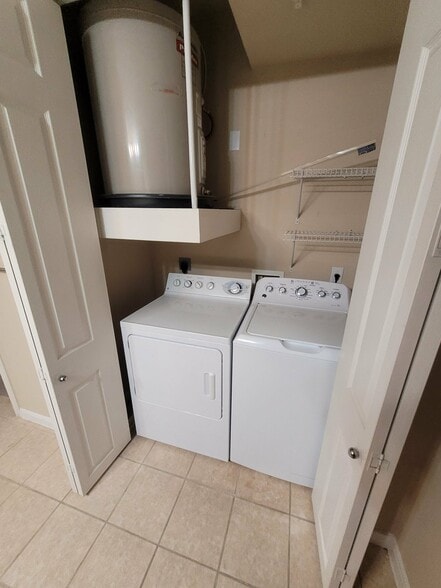 Washer and dryer in bathroom - 7575 Kirby Dr