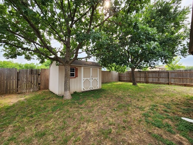 Building Photo - No Carpet / Storage Shed / Back Patio  /  ...