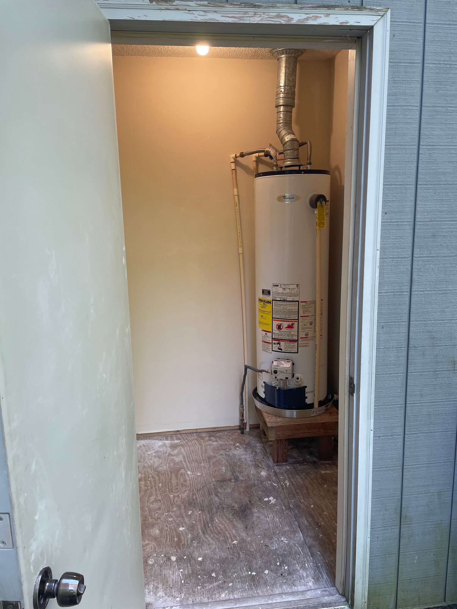 Gas hot water heater and storage off deck. - 6709 Langston Dr
