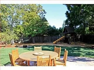 Building Photo - "Elegant 5-Bedroom Oasis with 4 Luxurious ...