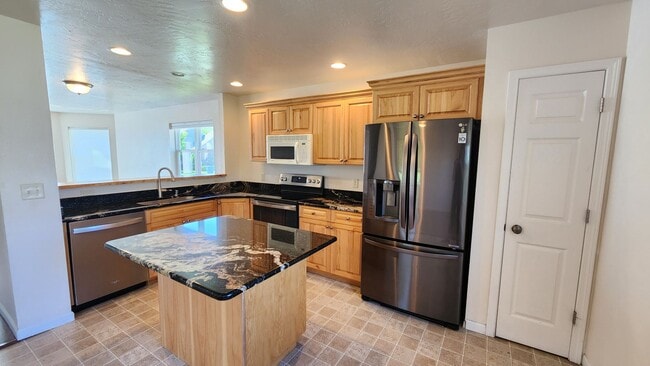 Building Photo - Beautiful House with Yard and Pets Considered