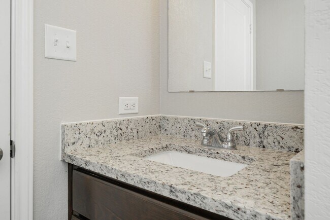 Building Photo - Live, love, and grow in this charming townhome!