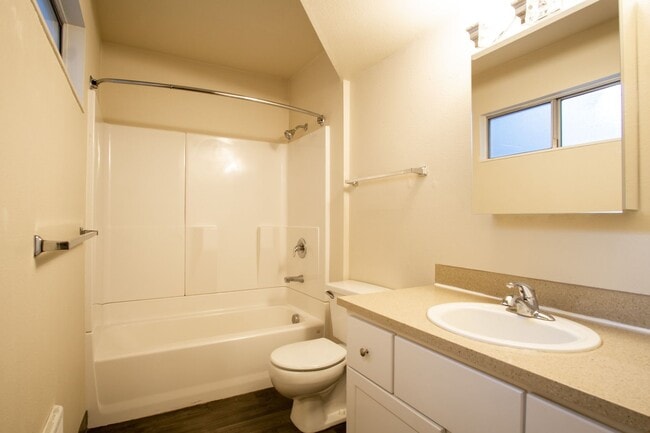 Building Photo - Gorgeous & Bright 1-Bed w/ Wood-Burning Fireplace, W/D, & Private Patio!