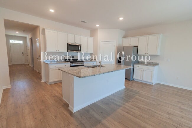 Building Photo - Spacious 4 Bedroom with Pond View