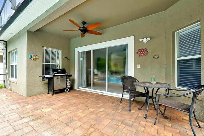 Building Photo - "Stunning 3BR Orlando Home with Private Screened Pool, Spa & Spacious Living Areas"